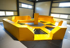 Sechseckige Trampolin-Spielstation mit rotierendem Balken im Cube Funpark Beselich, ideal für Reaktion und Ausweichen
