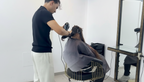 Frau mit gestyltem Haar nach einem Damenhaarschnitt im Salon Hamad Hair Cut in Dortmund