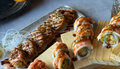 Sushi Platte bei DUI Sushi Essen – frisch zubereitete Special Rolls mit Lachs, Garnelen, Avocado, Toppings und hausgemachten Saucen