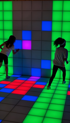 Zwei Personen im Pixel Room bei Room Escape Frankfurt während eines interaktiven Spiels mit leuchtenden Farbflächen an Boden und Wand
