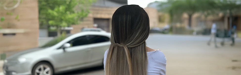 Elegant gebundene Haare mit natürlichem Farbverlauf bei Miraz Hair & Beauty Dortmund