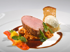 Gourmetgericht mit Fleisch, Sauce und Beilagen im Restaurant Balthasar in Paderborn