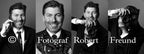 Porträt von Fotograf Robert Freund aus Düsseldorf mit Kamera und im Anzug